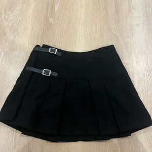 Elegant Black Mini Skirt with Buckle Accents